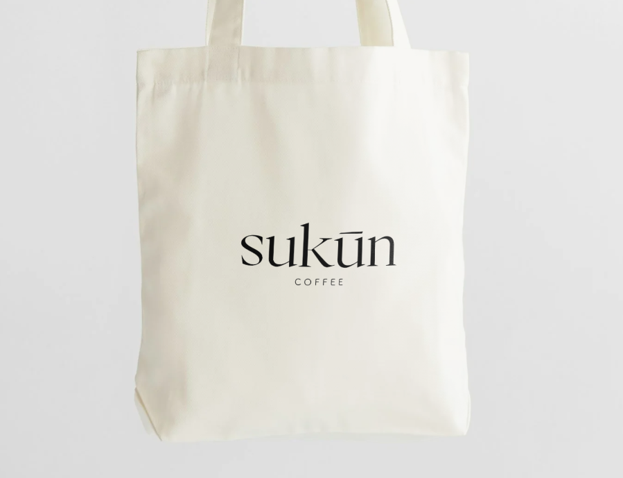 Sukūn Coffee tote bag with English wordmark